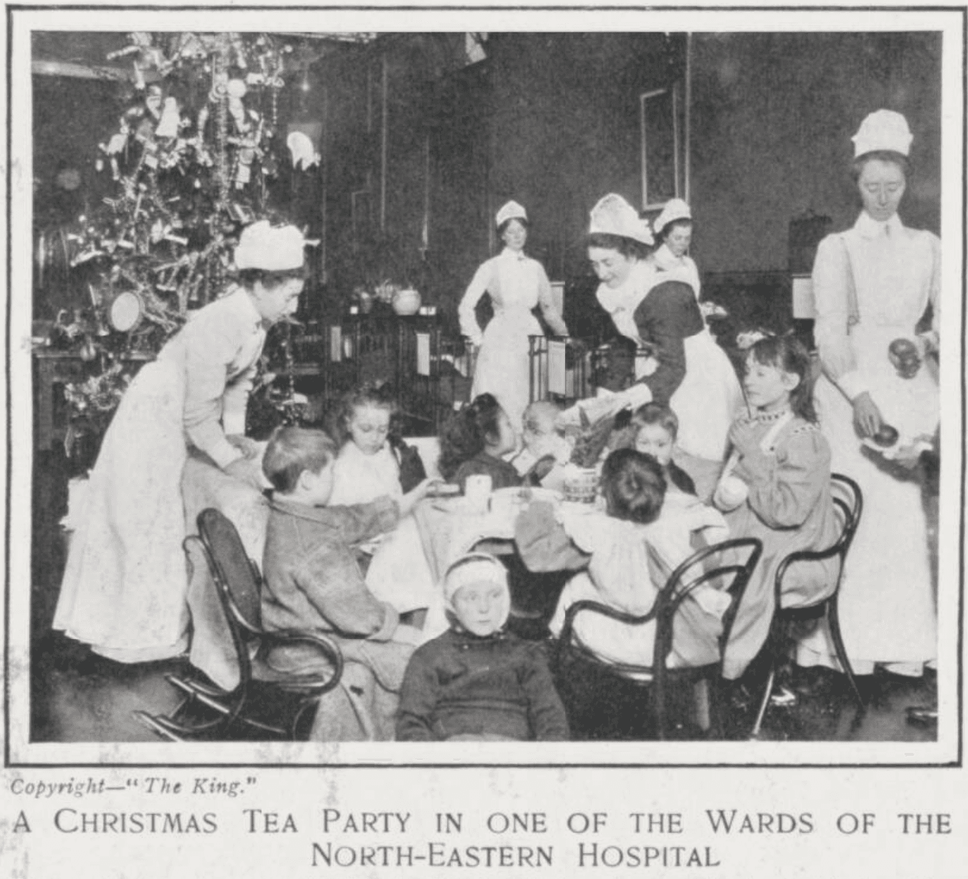 Children and nursing staff in a hospital ward in 1903